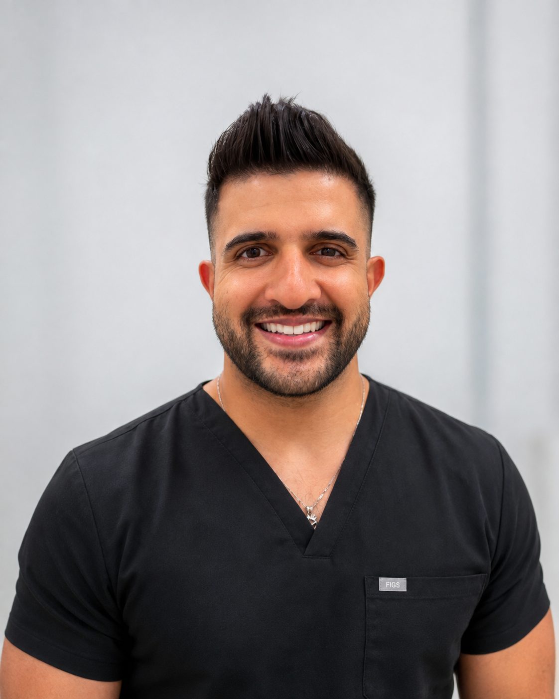Portrait of Dr Vikas Prinja, cosmetic, restorative and implant dentist in London
